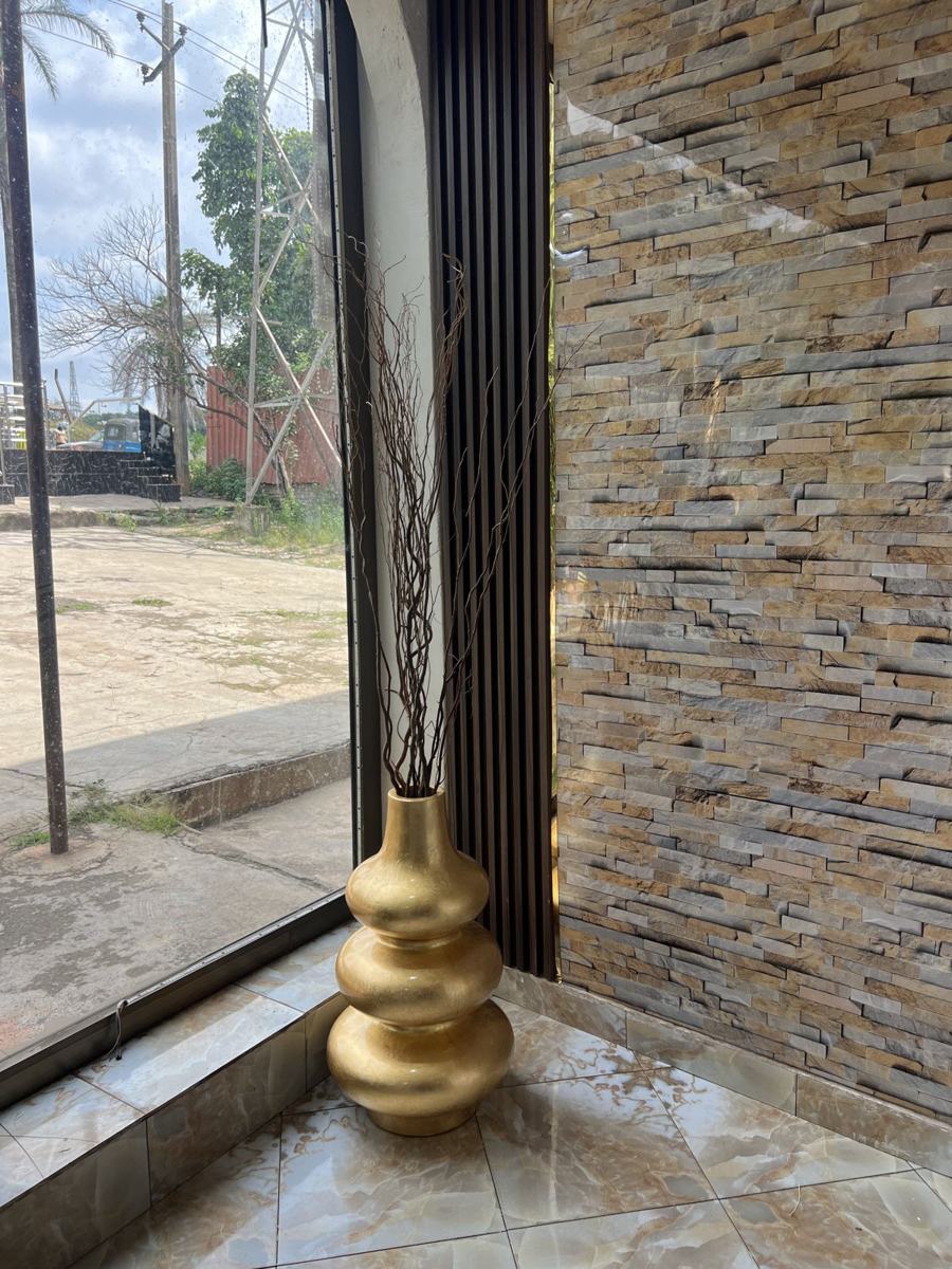 Gold bubble vase with branches